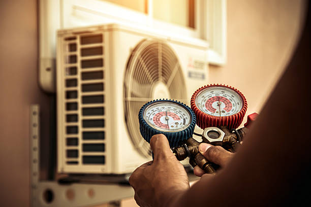 Professional Hvac Maintenance technician working in Collins, MS